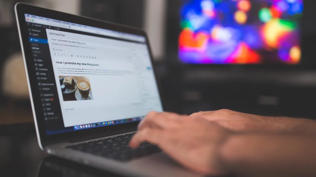 Wordpress developer working on his laptop
